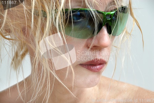 Image of Woman in Green Sunglasses