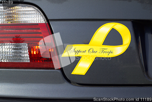 Image of Yellow Ribbon magnet  on a European car - Support Our Troops