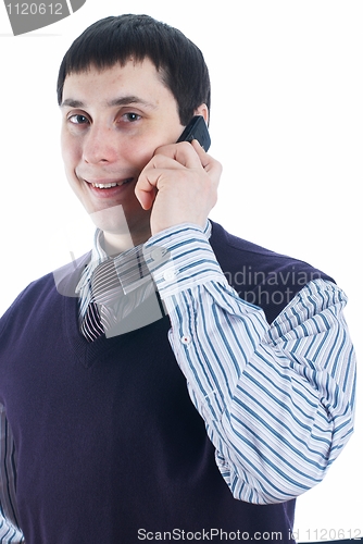 Image of Man talking by mobile phone