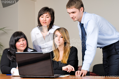 Image of Businessgroup with laptop