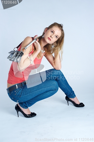 Image of Beautiful woman with bag