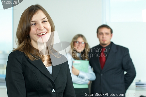 Image of Businesswoman with her team