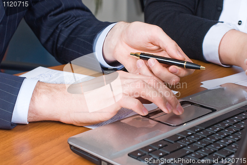 Image of Businessman with laptop