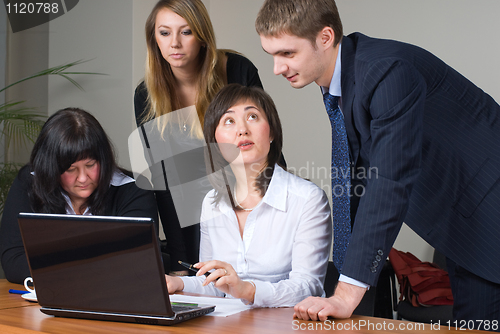 Image of Businessgroup with laptop