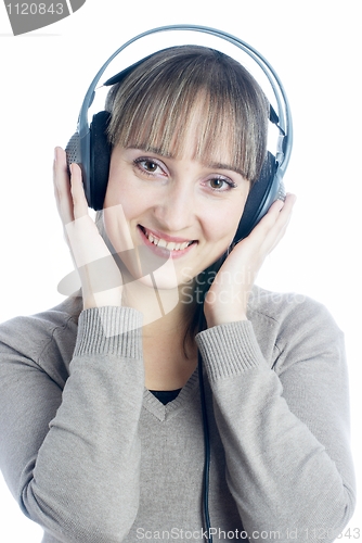 Image of Woman listening music