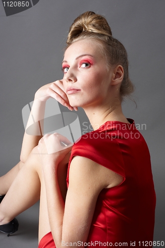 Image of Sexy slim woman in red dress