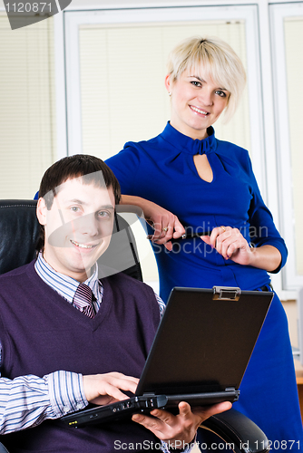 Image of Business team with laptop
