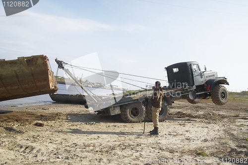 Image of Disassembly of pontoon bridge