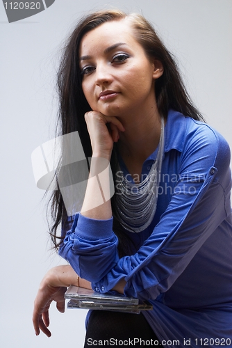 Image of Beatiful girl with cd