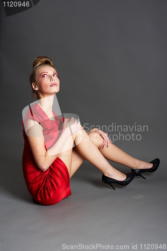 Image of Sexy slim woman in red dress