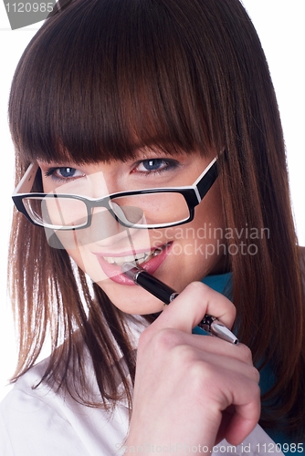 Image of Girl biting pen