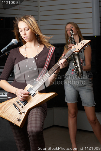 Image of Woman with guitar