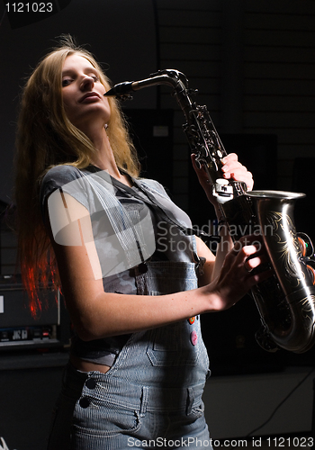 Image of Woman with saxophone