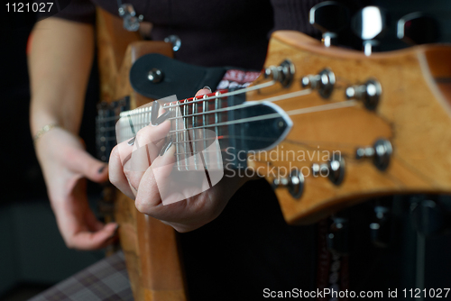 Image of Playing on guitar