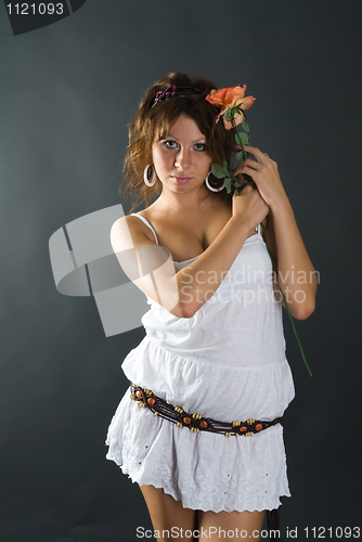 Image of Beautiful girl with flower
