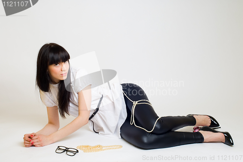 Image of Girl with beads