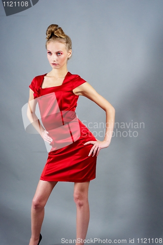 Image of Sexy slim woman in red dress