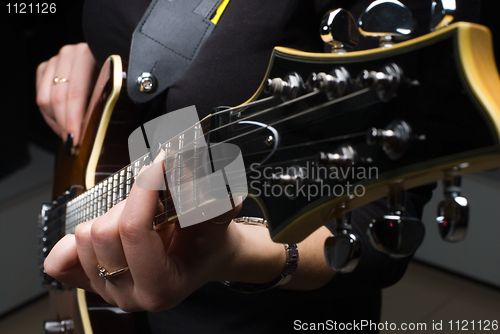 Image of Woman with guitar