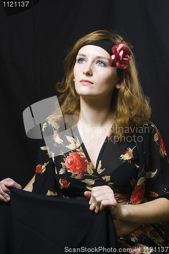 Image of Portrait of girl at black