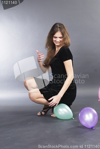 Image of Woman with balloons