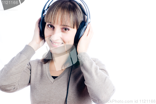 Image of Woman listening music