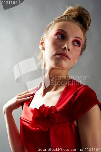 Image of Sexy slim woman in red dress