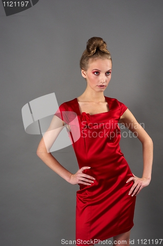 Image of Sexy slim woman in red dress