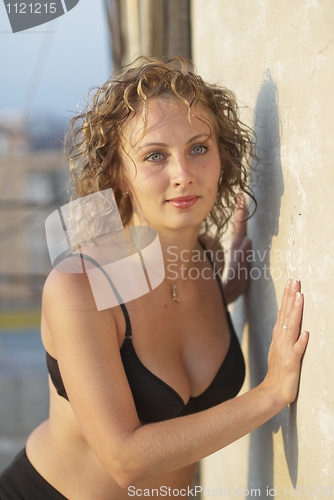 Image of Woman on roof