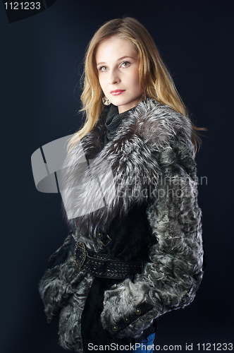 Image of Attractive woman in fur coat