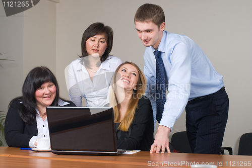 Image of Businessgroup with laptop