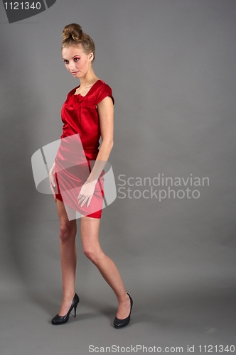 Image of Sexy slim woman in red dress