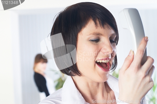 Image of Calling woman