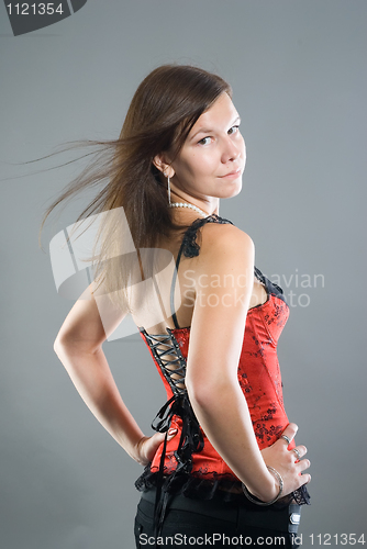 Image of Young woman in corset