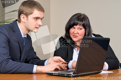 Image of Businessgroup with laptop