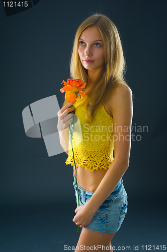 Image of Pretty girl with flower