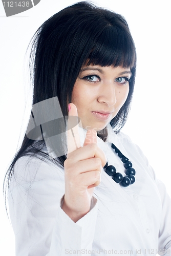 Image of Attractive young woman with her finger up