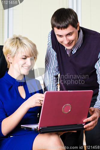 Image of Business team with laptop