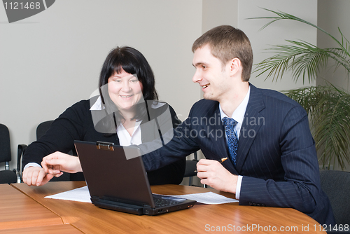 Image of Businessgroup with laptop