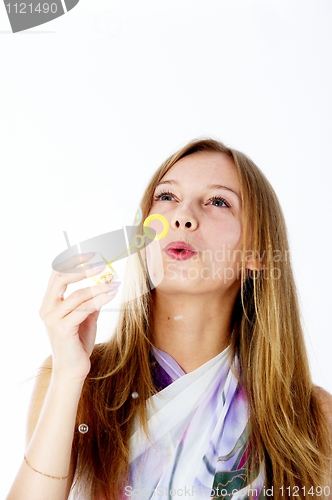 Image of Attractive girl with soap bubbles