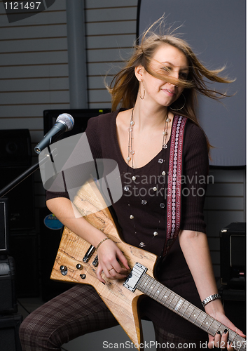 Image of Woman with guitar