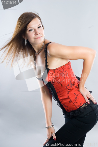 Image of Young woman in corset