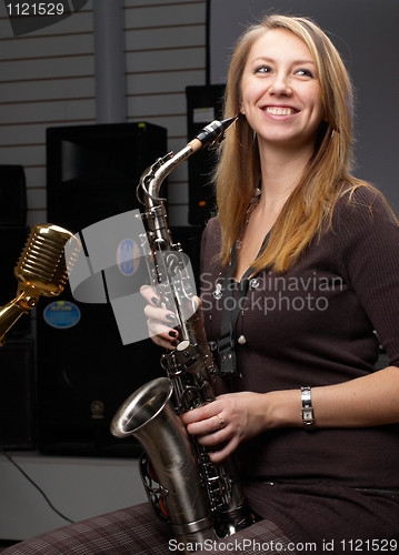 Image of Woman with saxophone