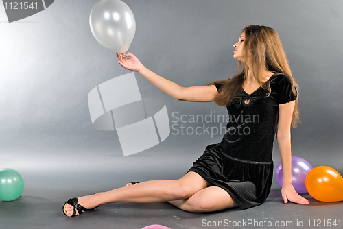 Image of Woman with balloons