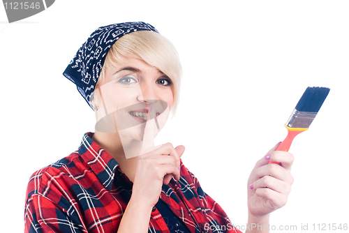Image of Young woman with paintbrush