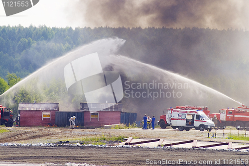 Image of Firefighters work