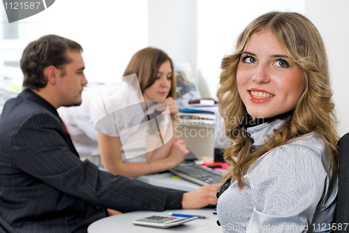 Image of Businesswoman with her team