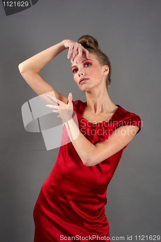 Image of Sexy slim woman in red dress