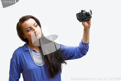Image of Young woman with camera