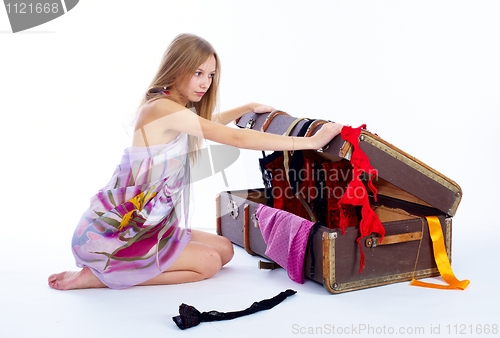 Image of Pretty woman with suitcase