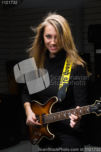 Image of Woman with guitar